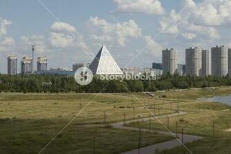 Shore Of The Yesil River In Astana With Palace Peace And