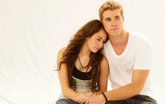 Miley Cyrus And Liam Hemsworth On A White Background Wallpaper