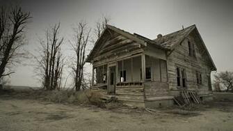 Abandoned Depression Era Dilapidated Farmhouse Front Wide With