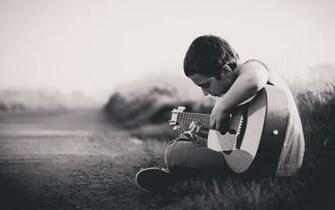 Lonely Boy Playing Guitar HD Image New Wallpaper Altered