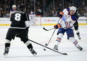 Taylor Hall Of The Edmonton Oilers Shoots Puck Past