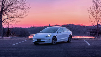 Tesla Model At Sunset Wallpaper