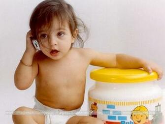 Baby Girl With Mobile Imagepk