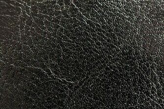 Shiny Black Leather Texture On A Suitcase