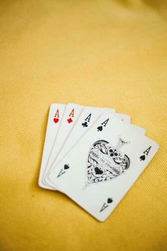 HD Wallpaper Ace Playing Cards On Brown Textile Card Game