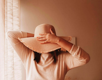 Timid Person Hiding Facewith Hat Yih5og96xll3lrx4 Wallpaper