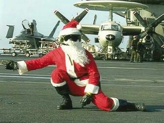 Santa On Flight Deck Christmas Wallpaper Image