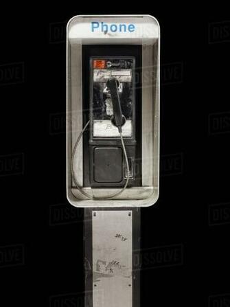 Abandoned Pay Phone Against Black Background Stock Photo Dissolve