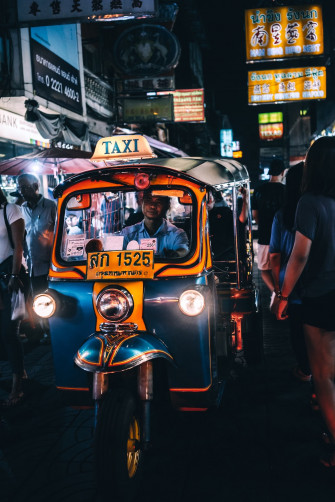 Person Riding On Taxi Cub Photo Asia Image