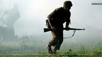 Soldier With Rifle In War Wallpaper