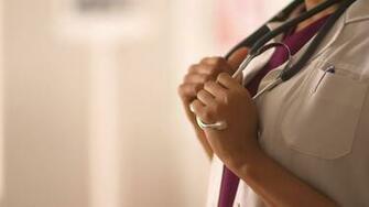 Close Up Of Female Doctor S Hands Holding Stethoscope