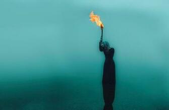 A Woman With Torch Wallpaper And Image Pictures