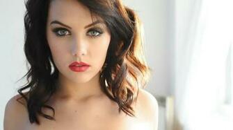 Brunette Girl With Green Eyes