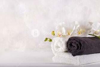 Spa Massage And Wellness Gray White Towels Orchids On Grea