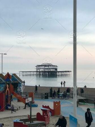Hove Seafront Playground With West Pier Ruins In