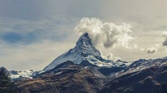 Photo Mountain With Clouds Day Daytime