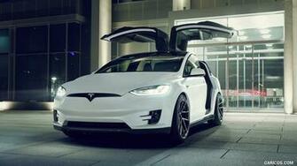 Novitec Tesla Model X Doors Up Front Three Quarter HD