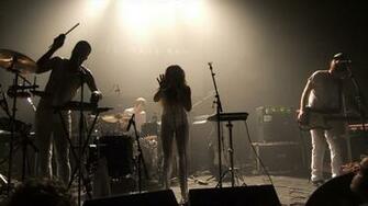 Indie Pop New Wave Concert Microphone Guitar Drums Wallpaper