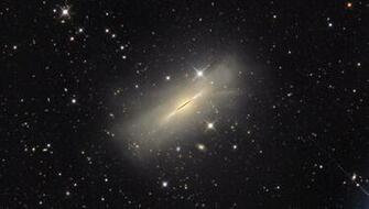 Bad Astronomy Solving The Riddle Of Edge On Galaxy Ngc