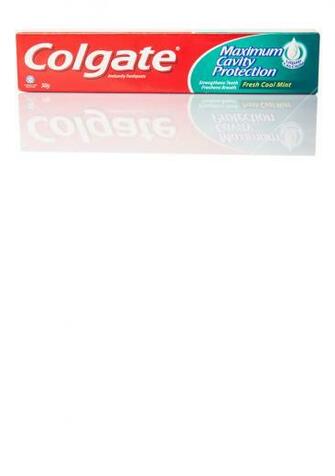 Colgate Toothpaste Over White Background Royalty Stock Image