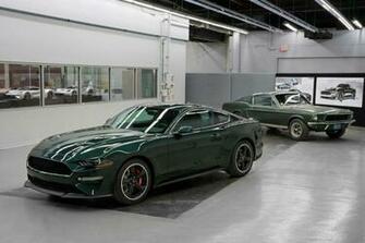 Green Ford Mustang Bullitt Parked With A Gt