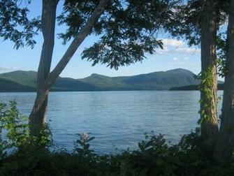 Lake George Top Sun Reflection Man