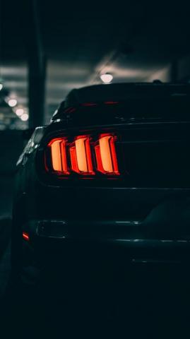Black Car With Red Light Photo Image