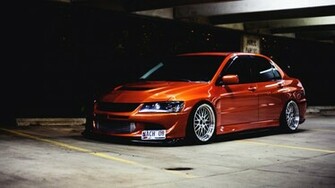 You Are Here Home Car Wallpaper Orange Mitsubishi Lancer