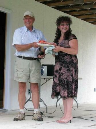 Bob Hamilton Accepts Cooked Lobsters From Gisele Won On A Name Tag