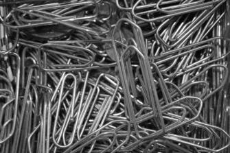 Silver Paper Clip And Red Black Pencil Image