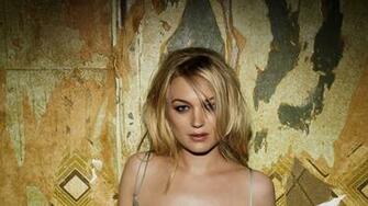 Sophia Myles In Front Of The Wall Wallpaper