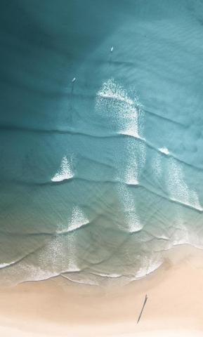 Peaceful Beach Calm Sea Waves Aerial