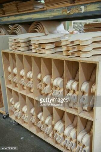 Shelves Of Unfinished Guitar Bodies At The Gibson Factory In
