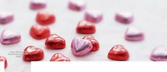 Shiny Heart Shape Candy With Blurry Background Cover