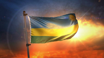 Rwanda Flag Backlit At Beautiful Sunrise Loop Slow Motion 4k