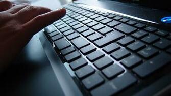 Wallpaper Person Typing On Black Keyboard
