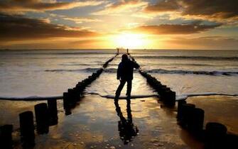 Loneliness Over A Kid Is Heart Breaking At Sunset Or Dusk Seaside