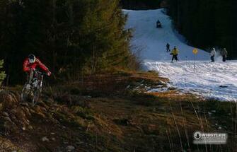 Mountain Bike Wallpaper From Whistler Showing A Biker Going Down The