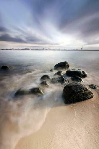 HD Wallpaper Black Rock In The Seashore During Cloudy Day