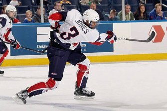 Seth Jones Of Columbus Blue Jackets In Action Wallpaper