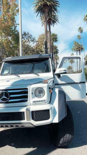 Santino Arceo On White Mercedes G iPhone Wallpaper