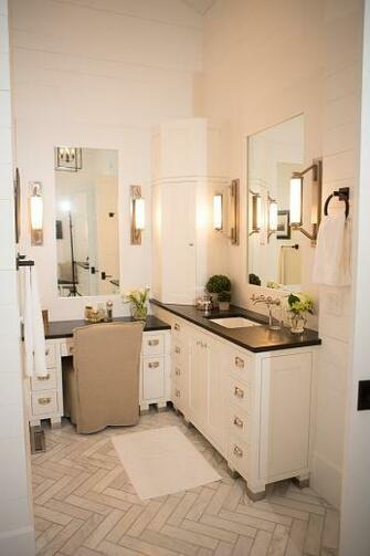 Atop A Marble Herringbone Floor Cornerbathroomcabinet Hahn Builders