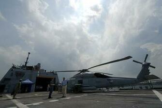 Defense Chuck Hagel Right Tours The Flight Deck Of Uss Dom
