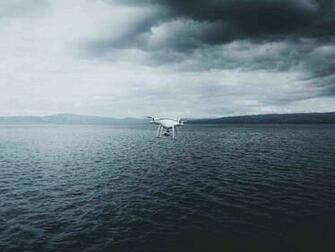 Quadrotor Drone On Ocean Wallpaper HD Stores