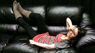 Miley Cyrus Brunette Celebrity Couch Smiling