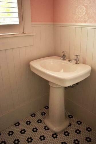 Traditional Farmhouse Powder Bathroom With Pedestal Sink Floral