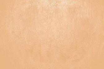 Light Orange Or Peach Colored Leather Close Up Texture Picture