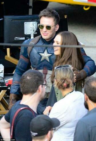 Elizabeth Olsen And Chris Evans On The Set Of Captain America