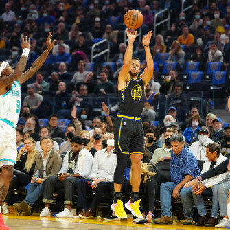 Steph Curry Shooting A Three Pointer Wallpaper