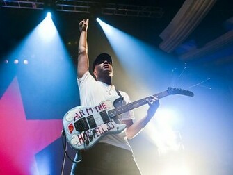 Tom Morello Guitar Hero Exotic Dancer